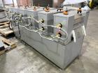 Used- Loynds 300 mm Wide Rolling & Scoring Line. Designed to make chiclets. Consisting of model GFL Dual Twin Screw Extruder...