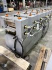 Used- Loynds 300 mm Wide Rolling & Scoring Line. Designed to make chiclets. Consisting of model GFL Dual Twin Screw Extruder...