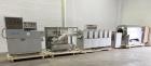 Used- Loynds 300 mm Wide Rolling & Scoring Line. Designed to make chiclets. Consisting of model GFL Dual Twin Screw Extruder...