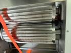 Used- Loynds 300 mm Wide Rolling & Scoring Line. Designed to make chiclets. Consisting of model GFL Dual Twin Screw Extruder...