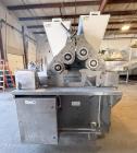 Used Baker Perkins Dualtex 4-Roll Extruder Model 595/1 – 48” Wide