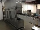 Used Belshaw 400 Donut Line. Including: infeed, double proof-box, fryer, fryer hood, 180 degree belt, small in- feed belt, Waterfall glazer, cooling belt, shortening filter and cake depositor, includ...