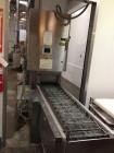 Used Belshaw 400 Donut Line. Including: infeed, double proof-box, fryer, fryer hood, 180 degree belt, small in- feed belt, Waterfall glazer, cooling belt, shortening filter and cake depositor, includ...
