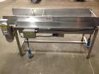 Used Belshaw 400 Donut Line. Including: infeed, double proof-box, fryer, fryer hood, 180 degree belt, small in- feed belt, Waterfall glazer, cooling belt, shortening filter and cake depositor, includ...