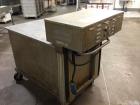 Used Belshaw 400 Donut Line. Including: infeed, double proof-box, fryer, fryer hood, 180 degree belt, small in- feed belt, Waterfall glazer, cooling belt, shortening filter and cake depositor, includ...