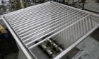 Used Mepaco Dual Auger Feeder, Model 105, 3,000 pound capacity, 304 Stainless Steel. Hopper is 60