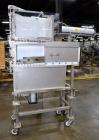 Used Cheese Block Cutter/Portioner. Machine is of stainless steel construction. Designed to cut blocks approximately (length) 17-1/2