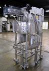 Used Cheese Block Cutter/Portioner. Machine is of stainless steel construction. Designed to cut blocks approximately (length) 17-1/2