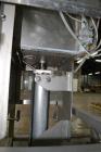 Used Cheese Block Cutter/Portioner. Machine is of stainless steel construction. Designed to cut blocks approximately (length) 17-1/2