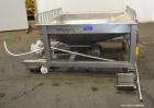 Used Peerless Spiral Flow Dough Feeder, Model SF-20CT, 304 Stainless Steel. 2000 Pound hopper capacity, approximately 66” long x 66” wide. Includes an approximately 8” diameter spiral auger, driven b...