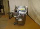 Used Rheon Cornucopia Extruder Encruster, Model KN400, Stainless Steel. Rated 60 PPM. Belt speed .07 - 1.20 feet per second (1.3-22 meters per second), .02 - .66 LB (10-300 gram) weight range, with a...