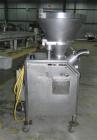 Used Vemag Reiser Continuious Vacuum Filler, Model Robot 500, Type 128/90. Filling rate up to 2,500 kg/hr depending on feed element, portion weight 5-30,000 g, can be set in increments of .01 or 1 g,...