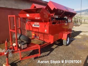 Used Kincade 36" Belt Thrasher. Powered by 10 HP Gasoline Engine.