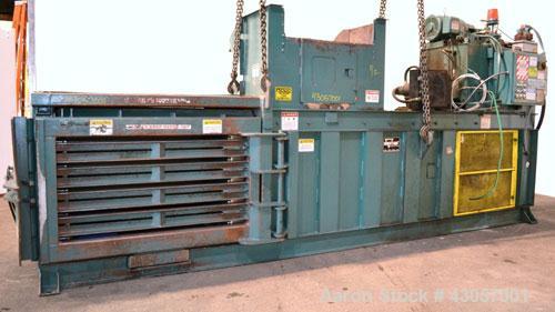 Used Marathon Equipment Closed End Horizontal Side Ejector Baler, Model SE-503042-830, Carbon Steel. Feed chamber 50’’ long x 30’’ wide with hopper. Bale weight up to 1500 pounds. Cycle time 20 secon...