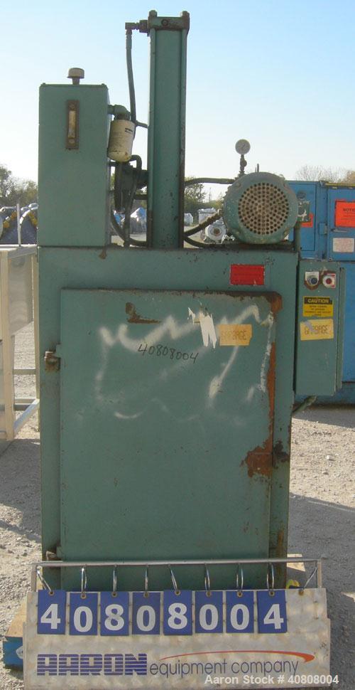 Used Maren Vertical Drum Crusher, Model 55, Carbon Steel. Approximate drum size 29" wide x 28 1/2" long x 39" tall. 26" Diameter plate. Driven by a 10 hp, 3/60/230/460 volt, 1745 rpm hydraulic motor.