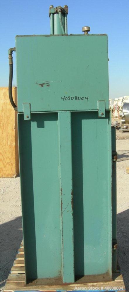 Used- Maren Vertical Drum Crusher, Model 55, Carbon Steel. Approximate drum size 29" wide x 28 1/2" long x 39" tall. 26" Dia...