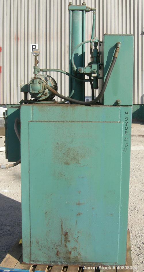 Used Maren Vertical Drum Crusher, Model 55, Carbon Steel. Approximate drum size 29" wide x 28 1/2" long x 39" tall. 26" Diameter plate. Driven by a 10 hp, 3/60/230/460 volt, 1745 rpm hydraulic motor.