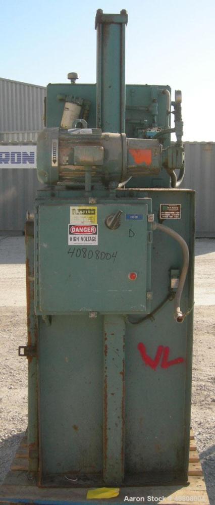 Used Maren Vertical Drum Crusher, Model 55, Carbon Steel. Approximate drum size 29" wide x 28 1/2" long x 39" tall. 26" Diameter plate. Driven by a 10 hp, 3/60/230/460 volt, 1745 rpm hydraulic motor.