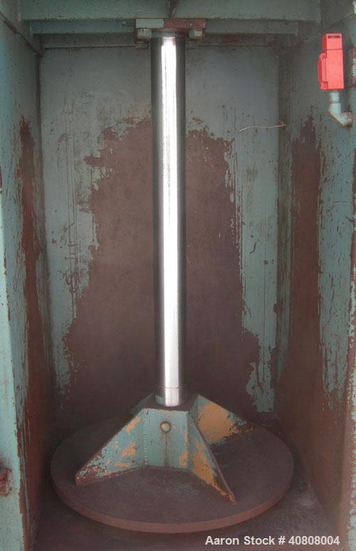 Used Maren Vertical Drum Crusher, Model 55, Carbon Steel. Approximate drum size 29" wide x 28 1/2" long x 39" tall. 26" Diameter plate. Driven by a 10 hp, 3/60/230/460 volt, 1745 rpm hydraulic motor.