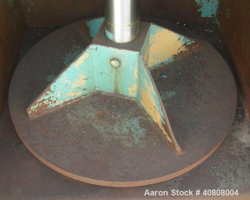 Used Maren Vertical Drum Crusher, Model 55, Carbon Steel. Approximate drum size 29" wide x 28 1/2" long x 39" tall. 26" Diameter plate. Driven by a 10 hp, 3/60/230/460 volt, 1745 rpm hydraulic motor.