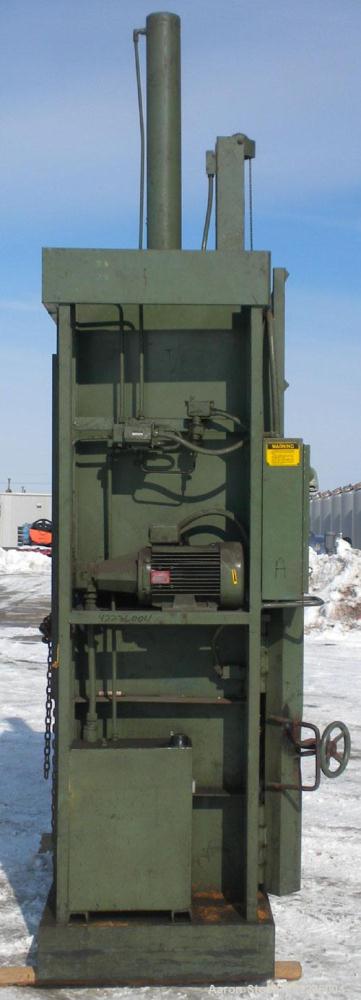 Used Fox Baler, model 72, carbon steel. Approximate bale size 72" long x 30" deep x 77" tall. Driven by a 10 hp, 3/60/200/230/460 volt, 1720 rpm motor. Includes controls. Mounted on a carbon steel ba...