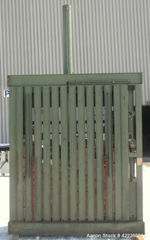 Used Fox Baler, model 72, carbon steel. Approximate bale size 72" long x 30" deep x 77" tall. Driven by a 10 hp, 3/60/200/230/460 volt, 1720 rpm motor. Includes controls. Mounted on a carbon steel ba...