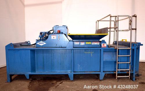 Used- Excel Manufacturing Horizontal Baler, Model EX60II, Carbon Steel. Approximate bale size 30" x 55". Top feed with chute...