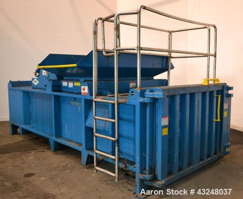 Used Excel Manufacturing Horizontal Baler, Model EX60II, Carbon Steel. Approximate bale size 30" x 55". Top feed with chute. Approximate 20hp motor.