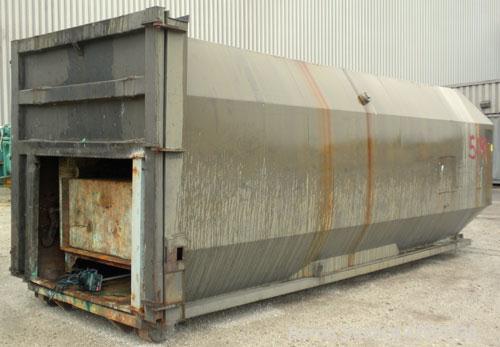 Used Octagonal Dock Feed Trash Compactor, approximately 40 yard receiving container, carbon steel. Side swing closure door. Single ram with an approximate 10 hp power pack. Dock feed platform with re...