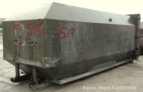Used Octagonal Dock Feed Trash Compactor, approximately 40 yard receiving container, carbon steel. Side swing closure door. Single ram with an approximate 10 hp power pack. Dock feed platform with re...