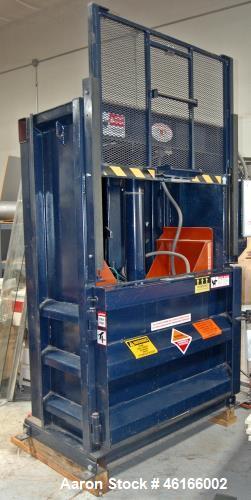 Used- Cram-A-Lot Vertical Baler for recycle aluminum, plastic, cardboard and more. Hanges in baler technology in decades. Th...