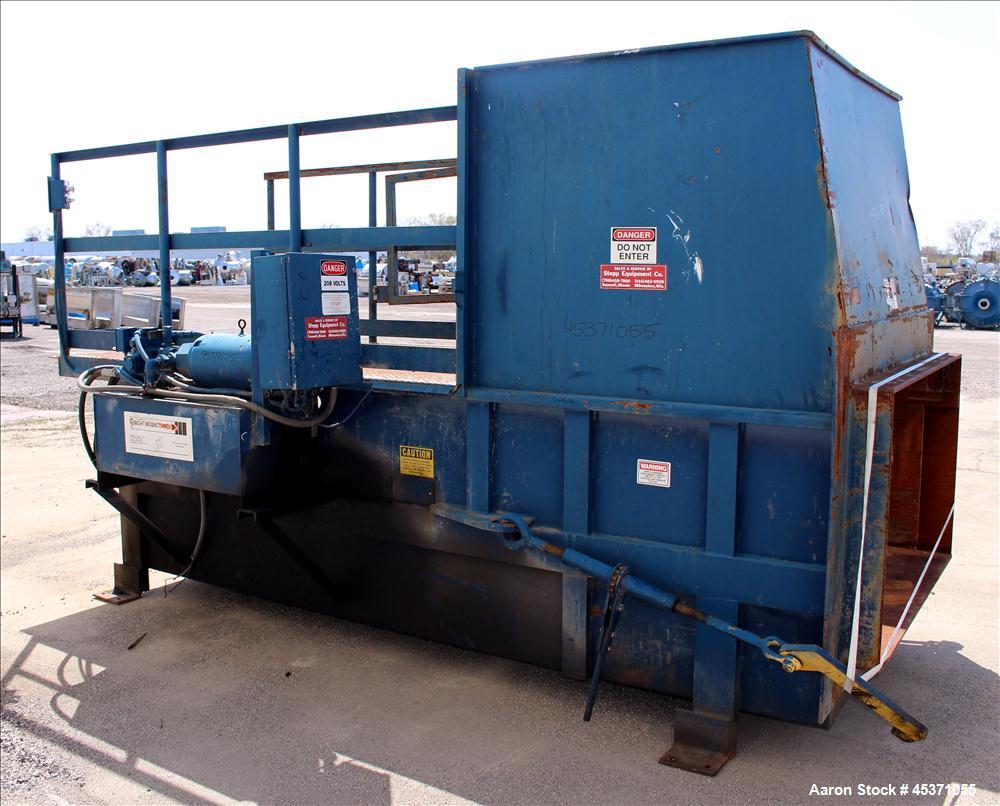 Used- Sebright Products Model 5060 Trash Compactor.