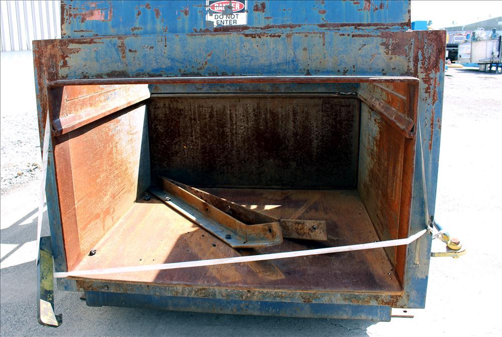 Used- Sebright Products Model 5060 Trash Compactor.