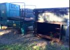 Used LoDal Stat-A-Pack Trash Compactor. 8 yard, has guide island, 208 volt.