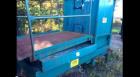 Used LoDal Stat-A-Pack Trash Compactor. 8 yard, has guide island, 208 volt.