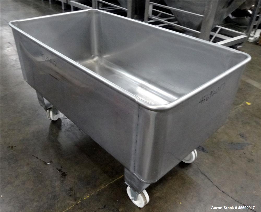 Used Stainless Steel Tub. Stainless steel tub 55-1/2" long x 29-1/2" wide x 19-1/2" tall, 1-1/2" diameter drain, mounted on casters.