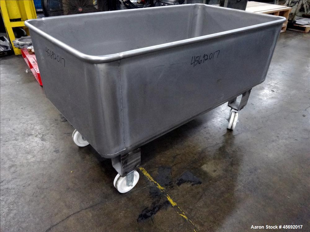 Used Stainless Steel Tub. Stainless steel tub 55-1/2" long x 29-1/2" wide x 19-1/2" tall, 1-1/2" diameter drain, mounted on casters.