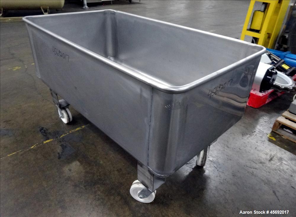 Used Stainless Steel Tub. Stainless steel tub 55-1/2" long x 29-1/2" wide x 19-1/2" tall, 1-1/2" diameter drain, mounted on casters.
