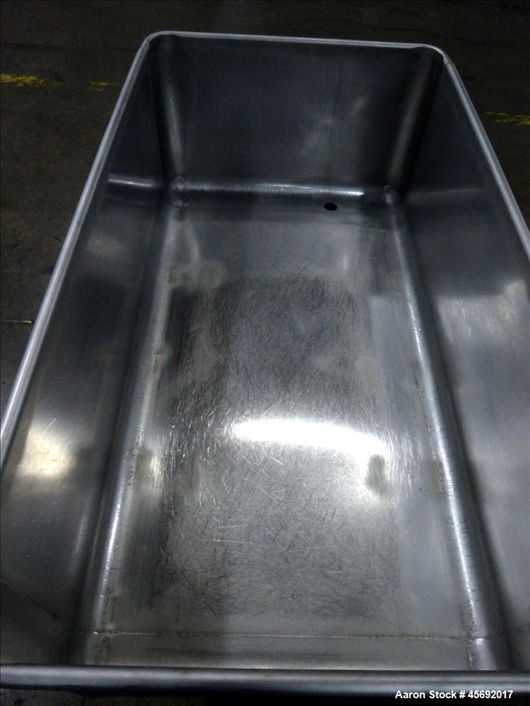 Used Stainless Steel Tub. Stainless steel tub 55-1/2" long x 29-1/2" wide x 19-1/2" tall, 1-1/2" diameter drain, mounted on casters.