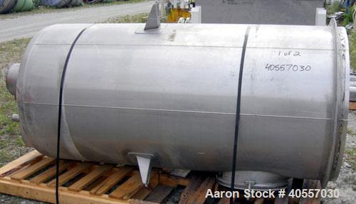Used Azo Live Bottom Bin Discharger, 304 stainless steel. Approximately 44'' diameter, 9 1/2'' center bottom outlet. Driven by a 1 hp, 3/60/575 volt, 1730 rpm motor. Includes an approximate 73 cubic ...