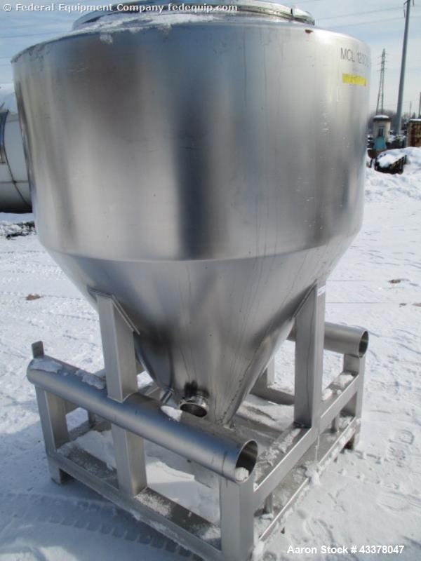 Used LB Bohle Bin, 1200 Liter (42 Cubic Feet), Model MCL1200S. Stainless steel construction. Approximately 60" diameter x 22" straight side, 36" cone bottom, 32" top opening with 8" center mounted bu...