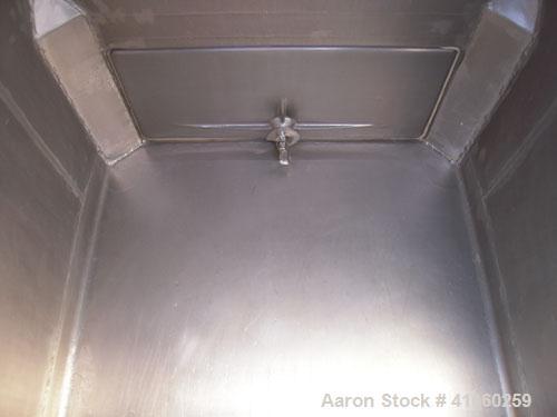 Used Custom Metal Craft Powder Stackable Tote Bin, Approximately 50 Cubic Feet, Aluminum. 48" Wide x 42" long x approximately 43" deep. 22" Diameter top opening with cover, 33" x 14" hinged side bott...
