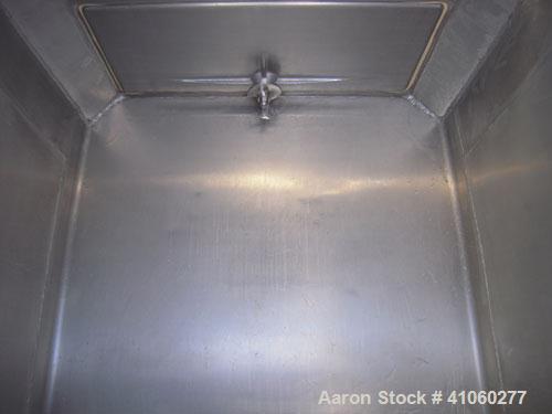 Used Custom Metal Craft Powder Stackable Tote Bin, Approximately 50 Cubic Feet, Aluminum. 48" Wide x 42" long x approximately 43" deep. 22" Diameter top opening with cover, 33" x 14" hinged side bott...