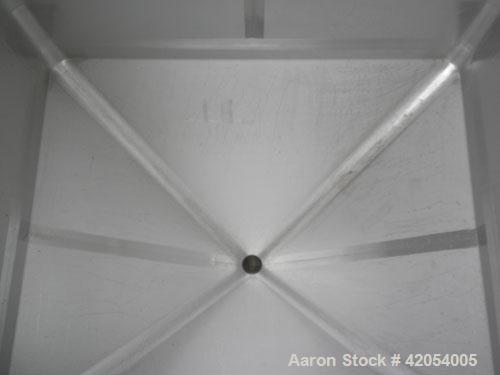 Used Custom Metalcraft Transtore Tote Bin, Approximately 33 Cubic Feet  (250 Gallon ) , 316 Stainless Steel. 46" long x 41" wide x 30" straight side x 24" cone bottom. 34" x 29" hole cut in top , 3" ...