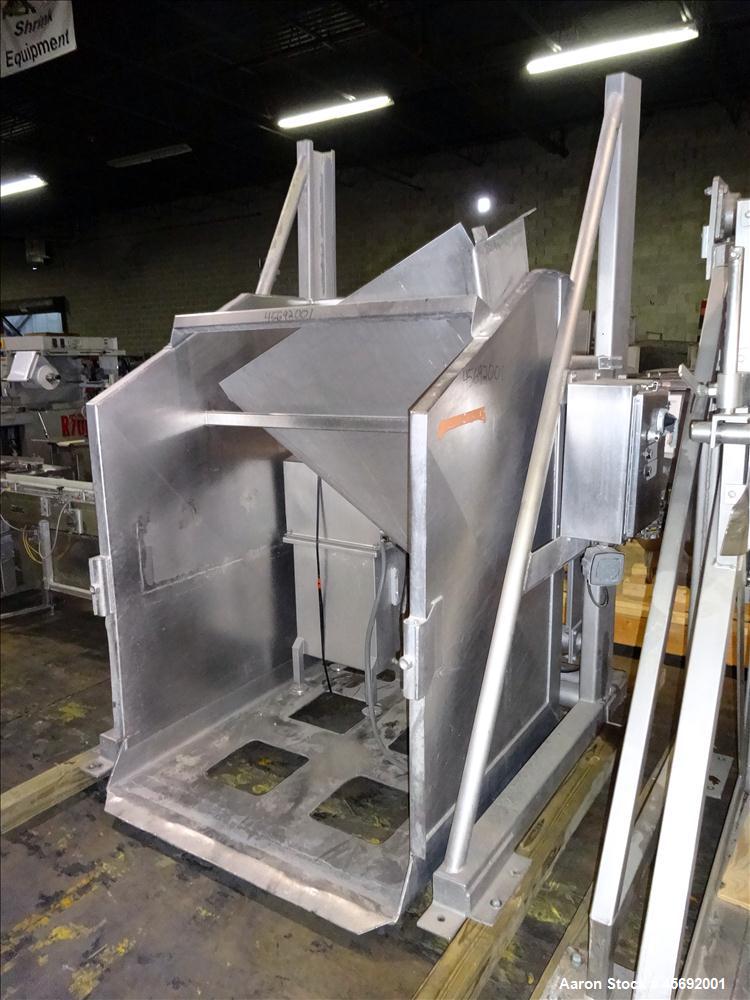 Used FPEC High Lift Gaylord Box Dumper, Model HLD 725, Stainless Steel. Has a capacity of 3,000 lbs, platform size of 48" long x 48" wide. Includes hydraulic power unit. Serial Number 3300. Input vol...