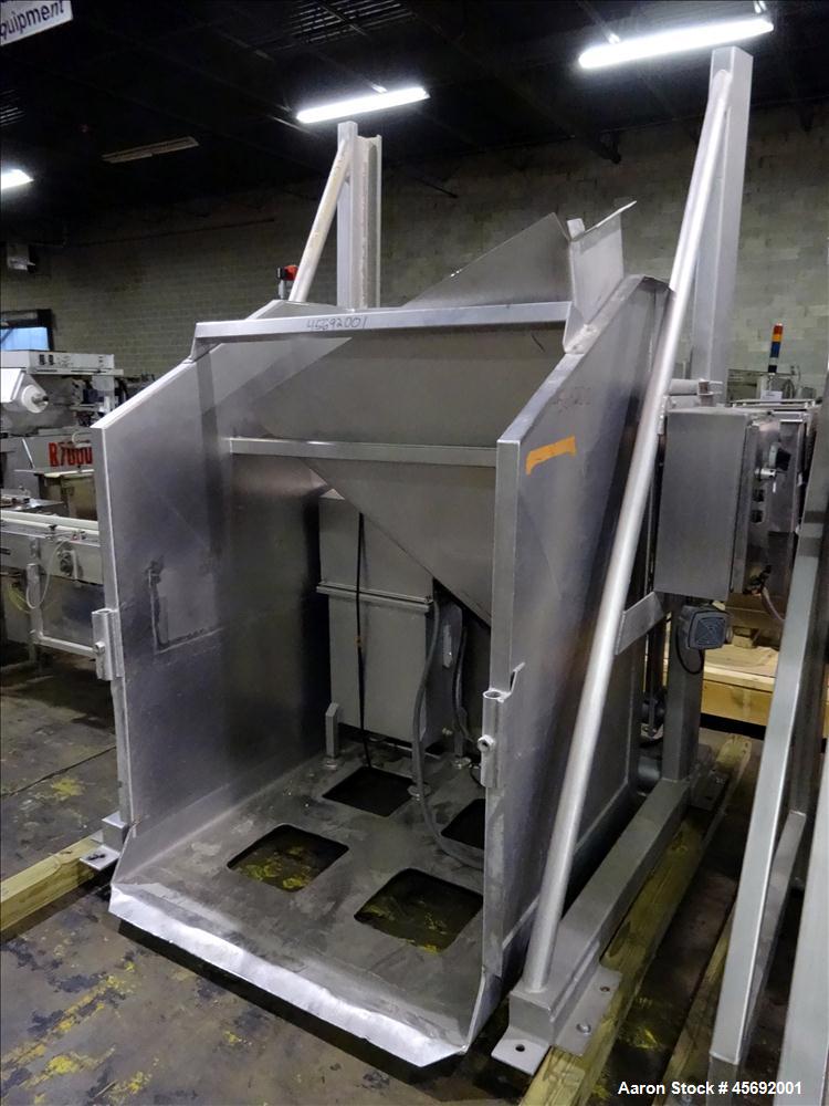 Used FPEC High Lift Gaylord Box Dumper, Model HLD 725, Stainless Steel. Has a capacity of 3,000 lbs, platform size of 48" long x 48" wide. Includes hydraulic power unit. Serial Number 3300. Input vol...