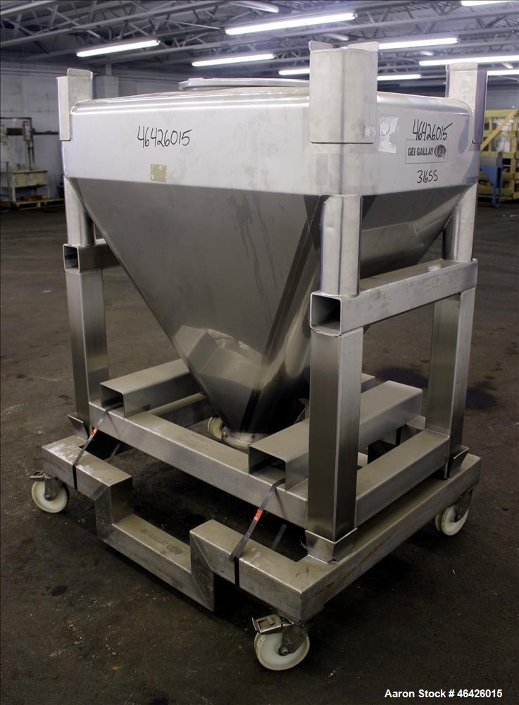 Used GEI Gallay Stackable Powder Tote Bin, Approximately 10 Cubic Feet, 316 Stainless Steel. Approximately 48" wide x 30" long x 10" straight side x 38" coned bottom. Flat top with an 18" opening wit...