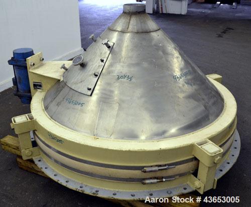 Used Metalfab Bin Activator / Bin Discharger, Model BA-5, 304 Stainless Steel.  Approximately 59-1/4" diameter, 5-1/2" center bottom outlet.  Driven by an approximately 1-1/2 hp, 3/60/230/460 volt, 1...