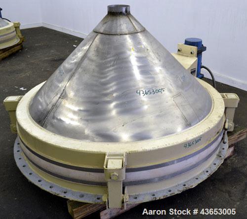 Used Metalfab Bin Activator / Bin Discharger, Model BA-5, 304 Stainless Steel.  Approximately 59-1/4" diameter, 5-1/2" center bottom outlet.  Driven by an approximately 1-1/2 hp, 3/60/230/460 volt, 1...