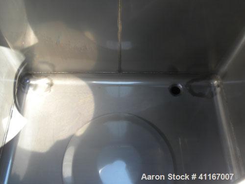 Used IBC Precision Stackable Liquid Tote, 46.7 cubic feet ( 350 gallon), model SS350, 304 stainless steel. 48’’ long x 42’’ wide x 36’’ deep. 22’’ diameter top opening with cover, off center bottom o...